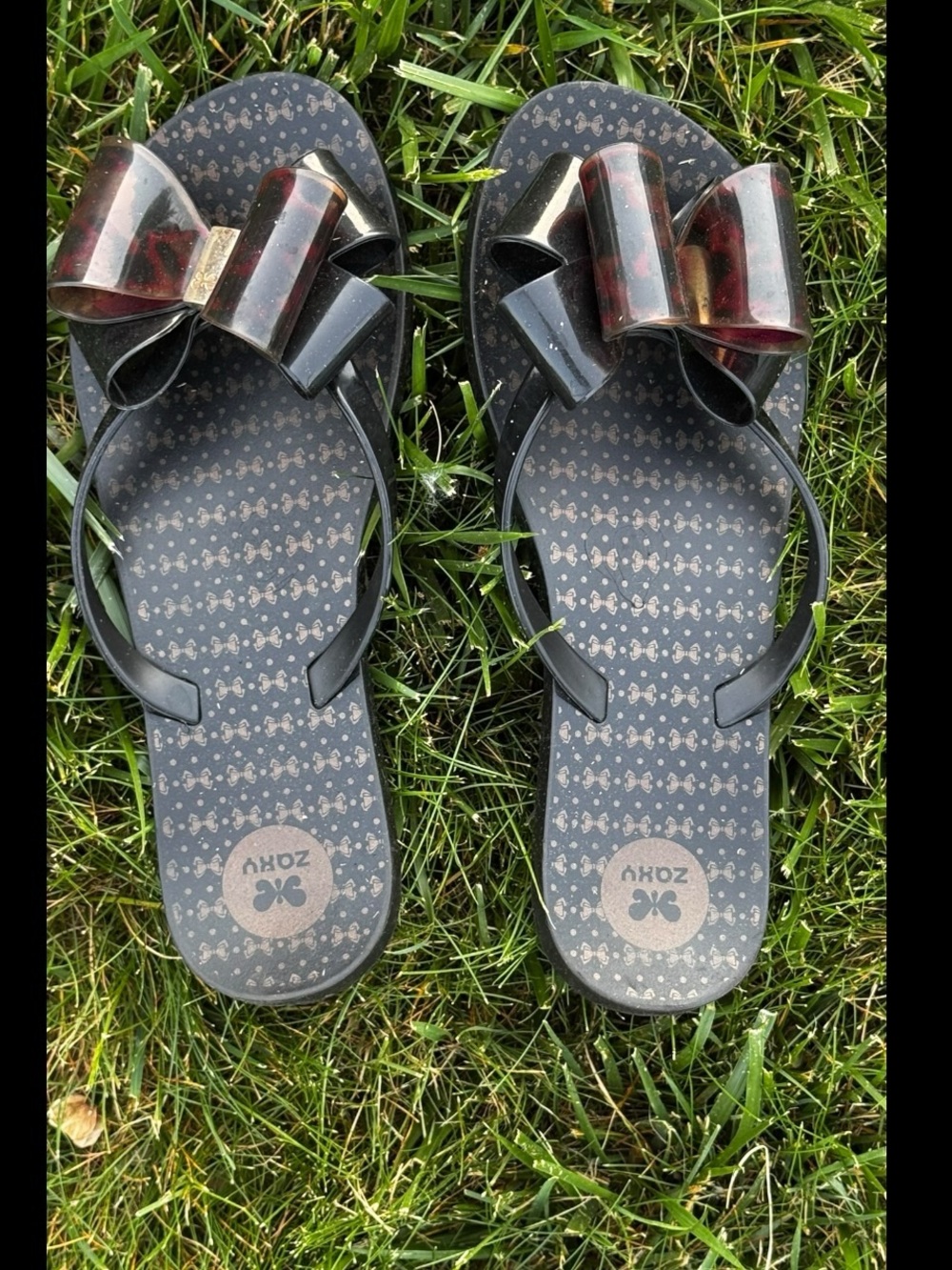 Zaxy Black Jelly Bow Flip Flops • Size 7